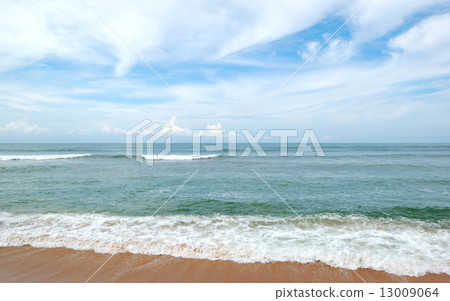 Beach and turquoise water of Indian Ocean, Bentota,  Sri Lanka 13009064