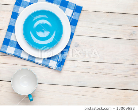 Empty plate, cup and towel Empty plate, cup and towel 13009688