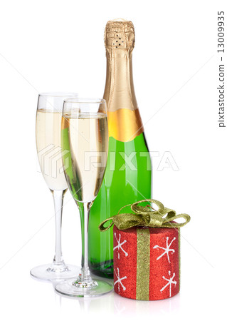 Champagne bottle, glasses and christmas decor 13009935