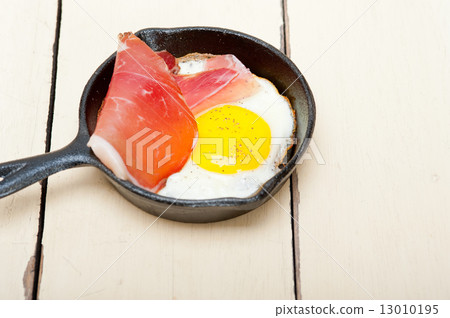 egg sunny side up with italian speck ham egg sunny side up with italian speck ham 13010195