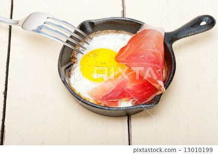 egg sunny side up with italian speck ham egg sunny side up with italian speck ham 13010199