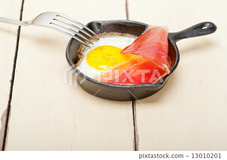 egg sunny side up with italian speck ham egg sunny side up with italian speck ham 13010201