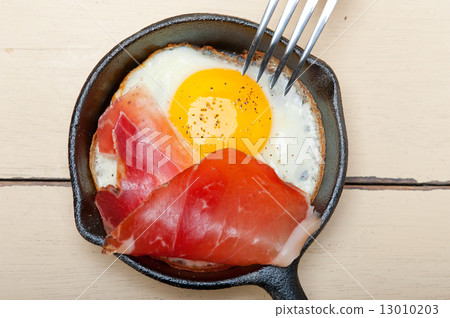 egg sunny side up with italian speck ham egg sunny side up with italian speck ham 13010203