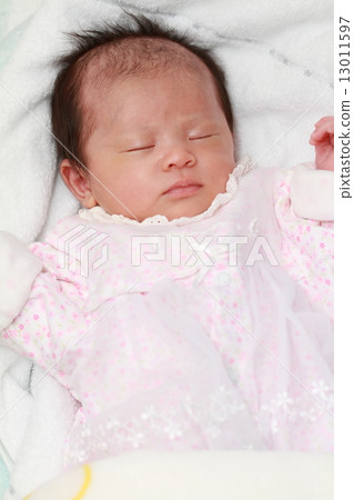 A baby's sleeping face of 1 month old baby 13011597