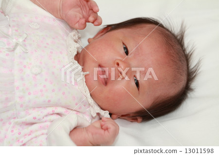 One month old baby's smile 13011598