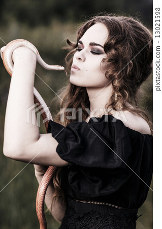 Woman with snake 13021598