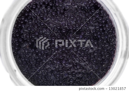 Black caviar in small round jar, top view 13021857