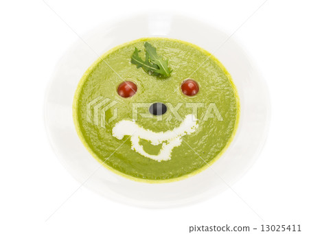pea soup  a white dish at restaurant 13025411