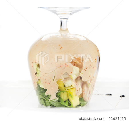 salad seafood cocktail in a glass goblet 13025413