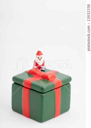 Santa Claus who is on the present box 13032336