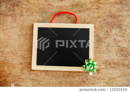 wooden frame and christmas decoration 13032919