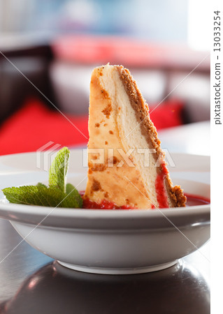cheesecake with berry sauce cheesecake with berry sauce 13033254