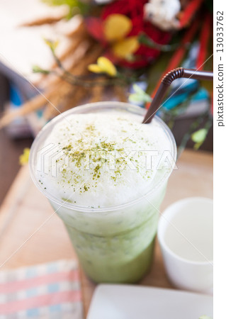 top view of green tea bubble cream in plastic glass 13033762