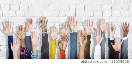 Group of Diverse People's Hands Raised 13035406
