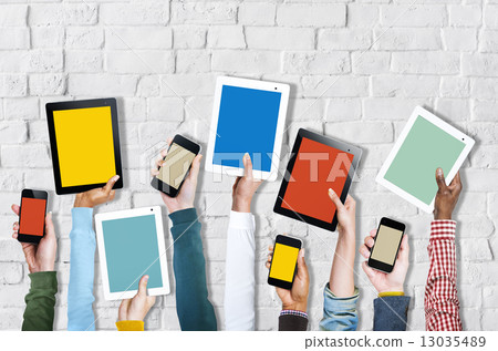 Group of Hands Holding Digital Devices 13035489