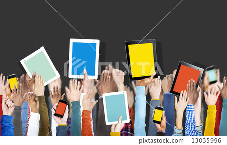 Group of Hands Holding Digital Devices with Copy Space Group of Hands Holding Digital Devices with Copy Space 13035996