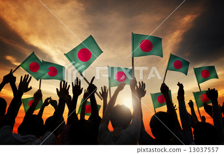 Silhouettes of People Holding Flag of Bangladesh Silhouettes of People Holding Flag of Bangladesh 13037557