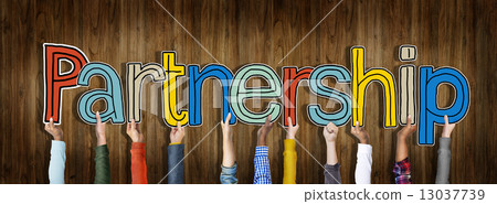 Multiethnic Group of Hands Holding Word Partnership Multiethnic Group of Hands Holding Word Partnership 13037739