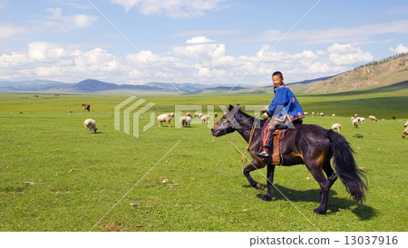 Boy Riding A Horse In A Beautiful Scenic View Of Nature 13037916