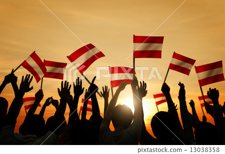 Silhouettes of People Holding Flag of Austria 13038358