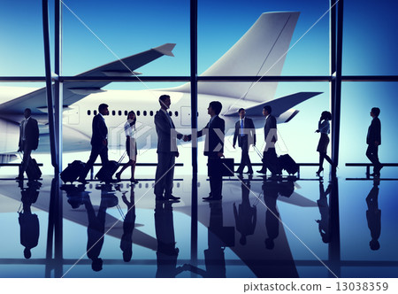 Silhouettes of Business People on an Airport 13038359