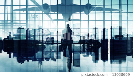 Businessman on the Phone Waiting to Travel 13038609