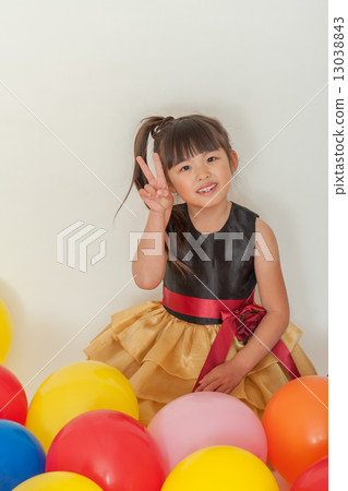 A girl who wears a piece in a dress A girl who wears a piece in a dress 13038843