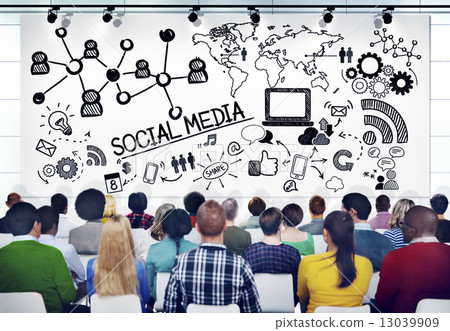 Diverse People in a Seminar About Social Media 13039909
