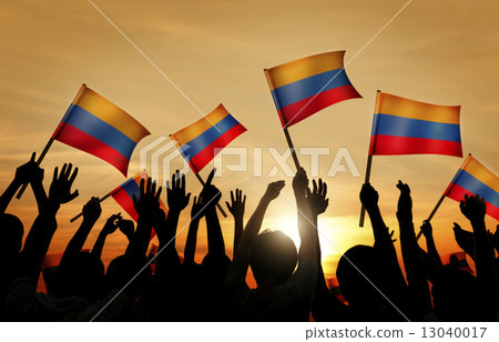 Silhouettes of People Holding Flag of Colombia 13040017