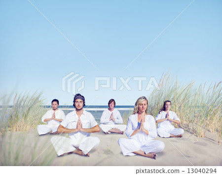 Group of People Doing Yoga on Beach Group of People Doing Yoga on Beach 13040294