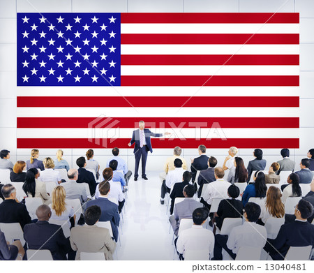 Business Meeting With An American Flag As A Background 13040481