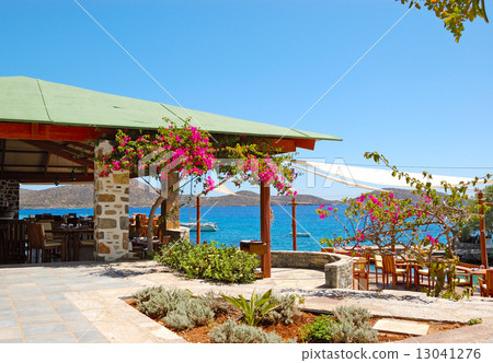 Traditional Greek open-air restaurant at luxury hotel, Crete, Gr Traditional Greek open-air restaurant at luxury hotel, Crete, Gr 13041276