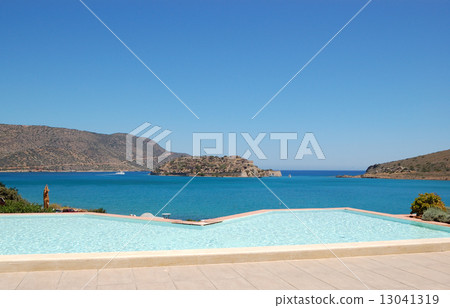 Swimming pool by luxury villa with a view on Spinalonga Island, Swimming pool by luxury villa with a view on Spinalonga Island, 13041319