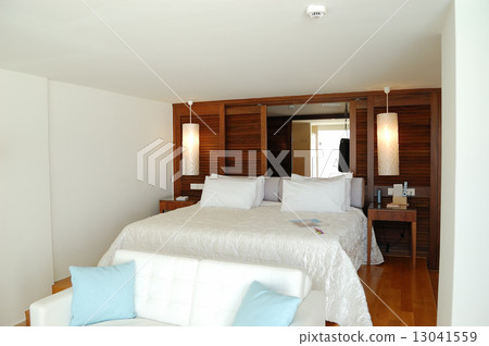 The bedroom in luxury apartment of modern hotel, Crete, Greece The bedroom in luxury apartment of modern hotel, Crete, Greece 13041559