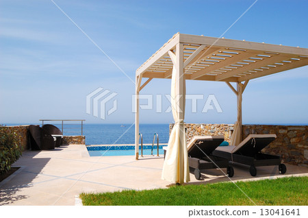 Swimming pool at the modern luxury villa, Crete, Greece Swimming pool at the modern luxury villa, Crete, Greece 13041641