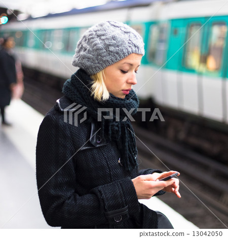 Woman on a subway station. 13042050