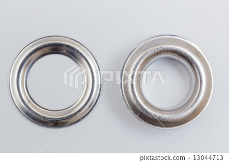 Rivets isolated on a light background as Cut 13044713