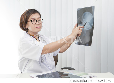 doctor sitting in working room 13051070