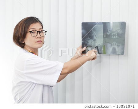 doctor sitting in working room 13051071