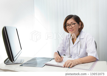 doctor sitting in working room 13051073