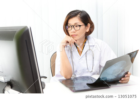 doctor sitting in working room 13051075