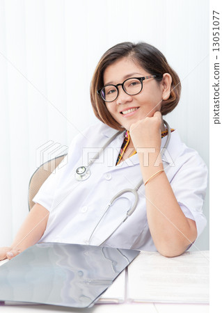 doctor sitting in working room 13051077