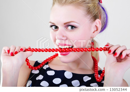 Woman beating red chaplet 13052344
