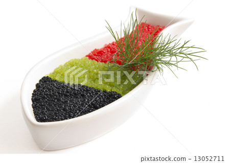 caviar in a bowl-shaped over caviar in a bowl-shaped over 13052711