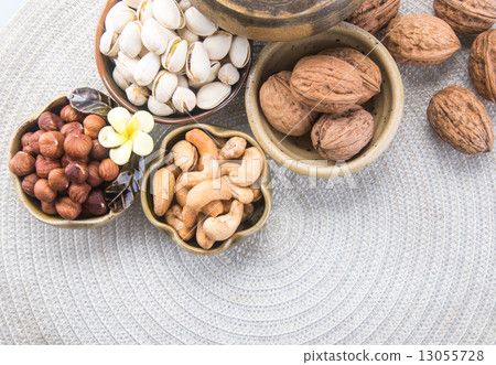 nuts. mixed nuts on the background 13055728