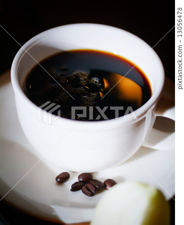 Cup of coffee with coffee beans on a beautiful background. Cup of coffee with coffee beans on a beautiful background. 13056478