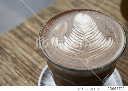Hot mocha serving on wooden table 13062711