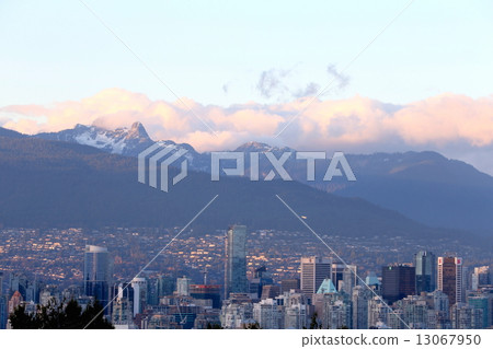 Lions Mountain and Sunset Vancouver Downtown - Grouse Mountain & Vancouver Downtown in Sunset Lions Mountain and Sunset Vancouver Downtown - Grouse Mountain & Vancouver Downtown in Sunset 13067950
