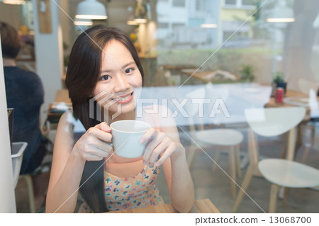 Smiling Woman looking out 13068700