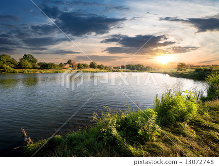 Blue river under clouds 13072748